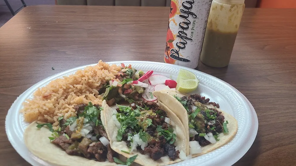 Two Carnitas Tacos and Two Carne Asada Tacos